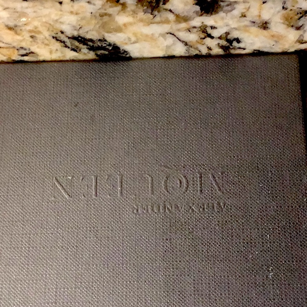 Alexander McQueen gold card holder with tags. Pristine and unused